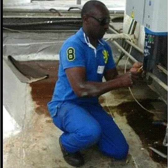 Mobile Fridge Repairs technician doing gas work on site